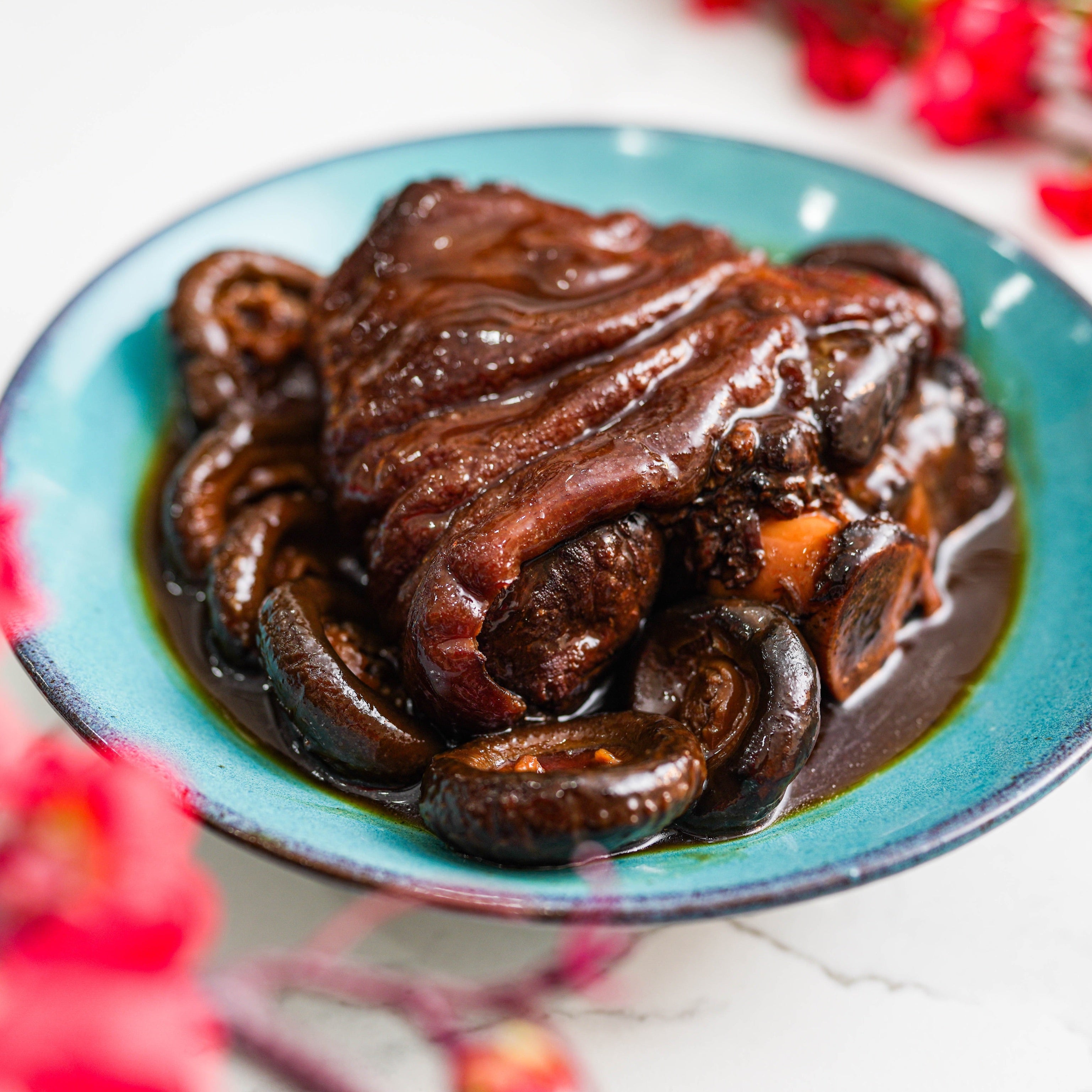 BRAISED PORK KNUCKLE WITH MUSHROOMS